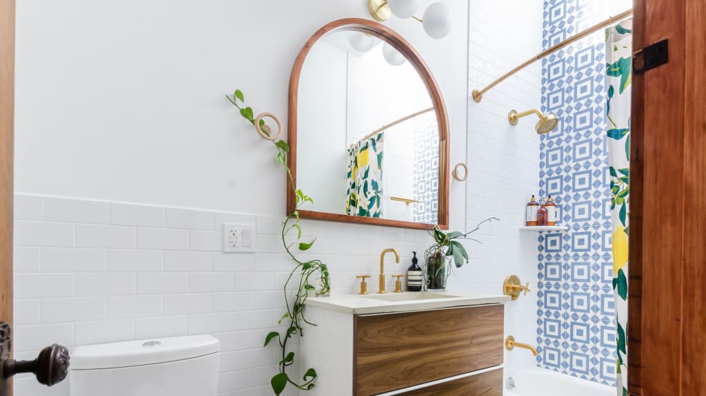 Modern bathroom with free-standing bath and ceramic walls