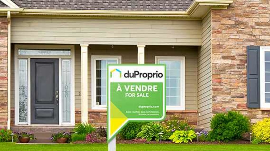 House for sale with Duproprio sign