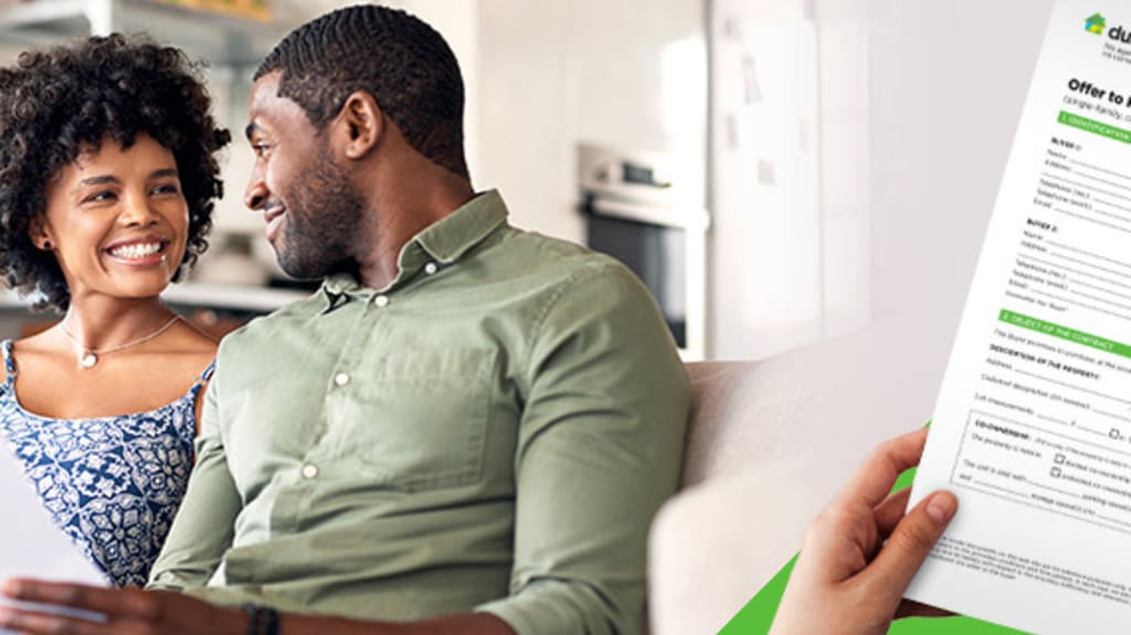 Couple thinking while looking at offer to purchase