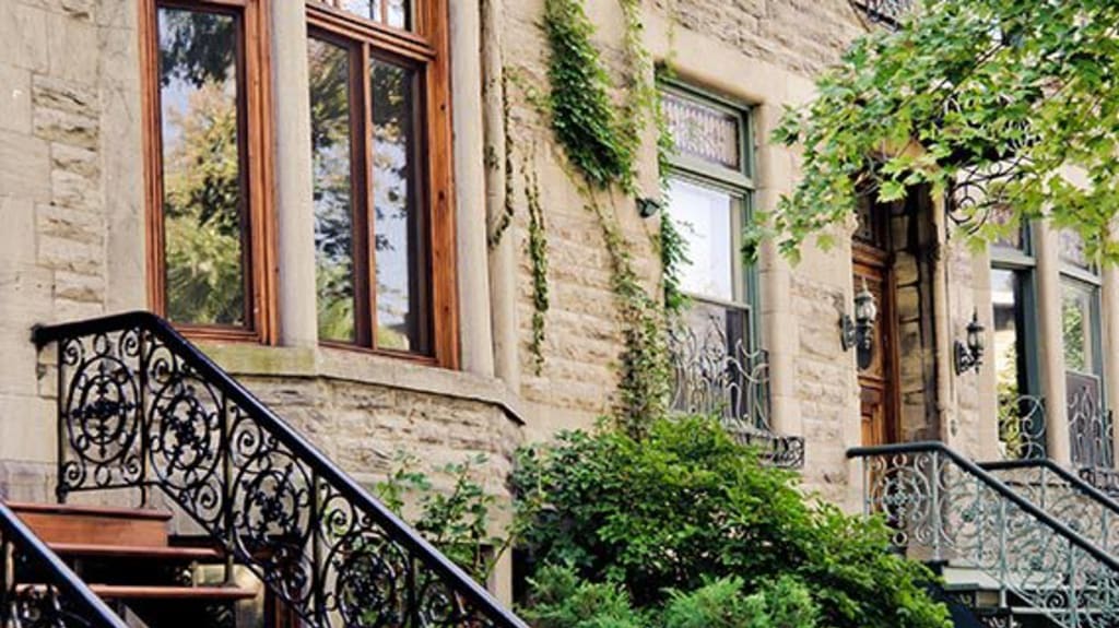 Row houses with black wrought iron stairs