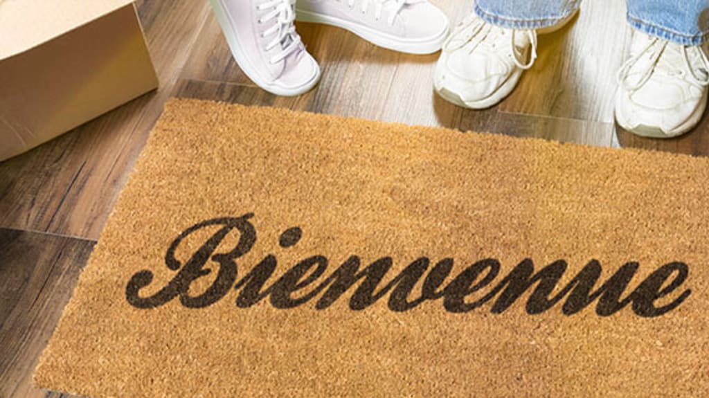 tapis d'entrée nouvelle maison avec mention bienvenue