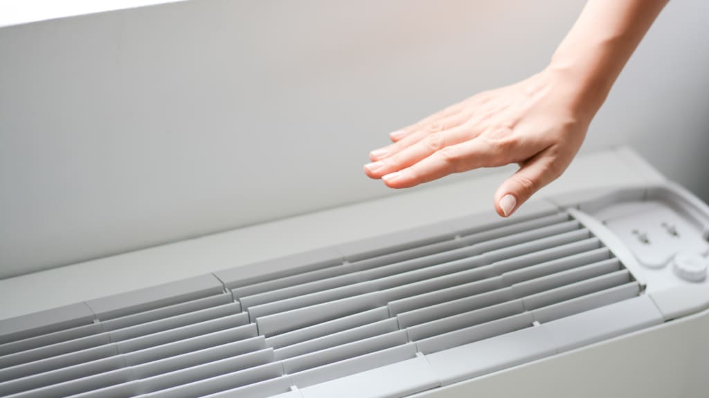 Air conditioner and air temperature hand control