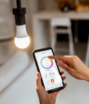 Smart bulb with dimmer installed on a cell phone