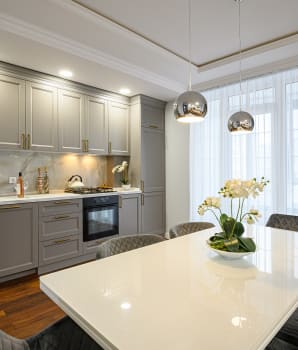 White sheer curtain and attached curtain as kitchen window treatment