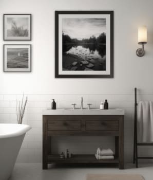 Landscape photo frame above a washbasin cabinet