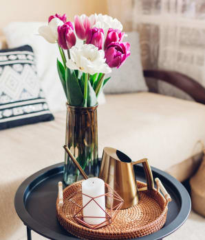 Bouquet of flowers on living room coffee table