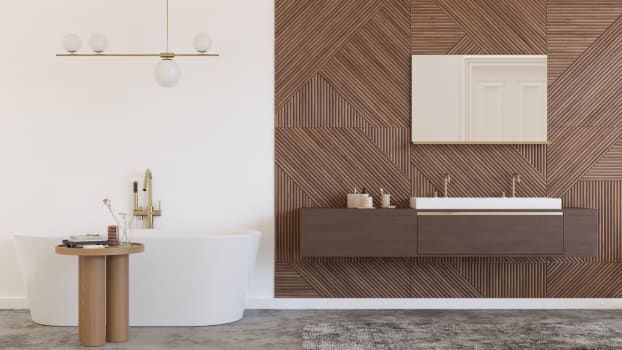 White bathroom with textured wood accent wall 