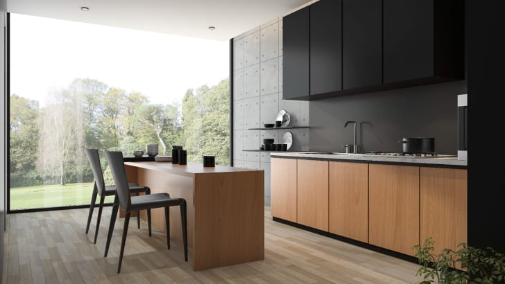 Minimalist black kitchen with wooden cabinets and kitchen island