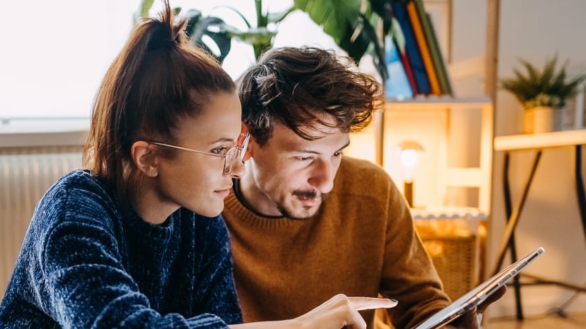 Couple looking at tablet