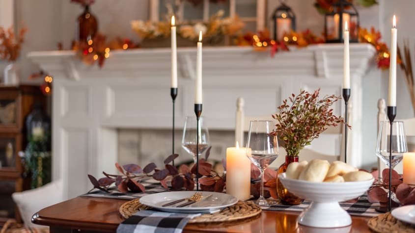 Elegant Thanksgiving dinner table decorated for fall