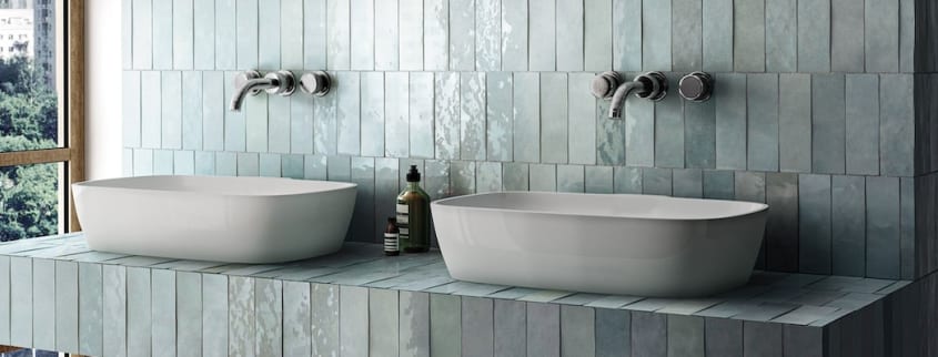 Ceramic tile installed vertically extends the bathroom space