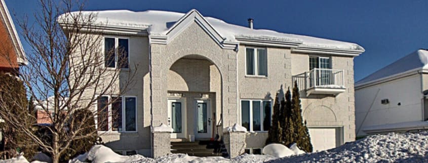 Immeuble locatif dans un paysage d'hiver