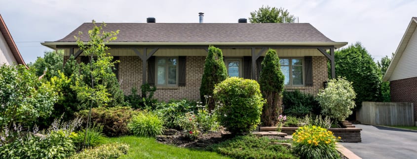 Front view of a suburb brick bungalow