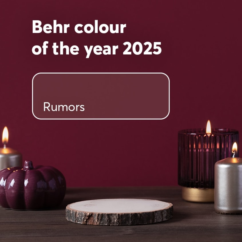 Rumors, Behr 2025 colour of the year on a wall with candles and wooden coaster