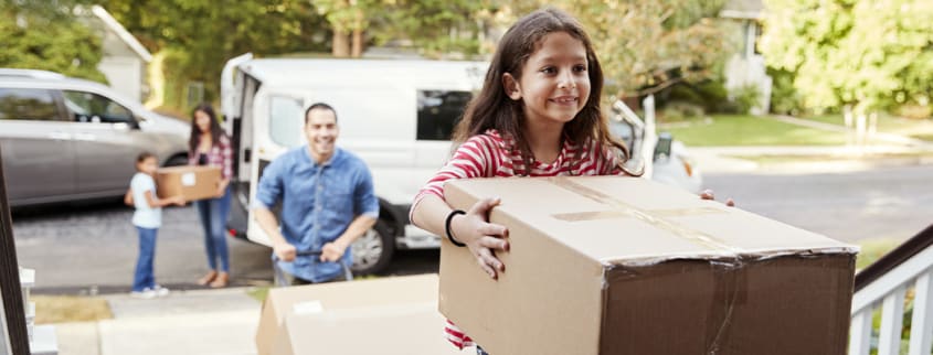 Family moving into their new house