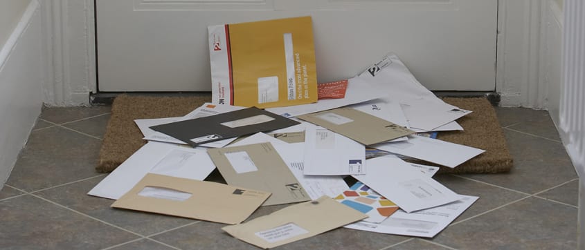 Mail pilling up at the door