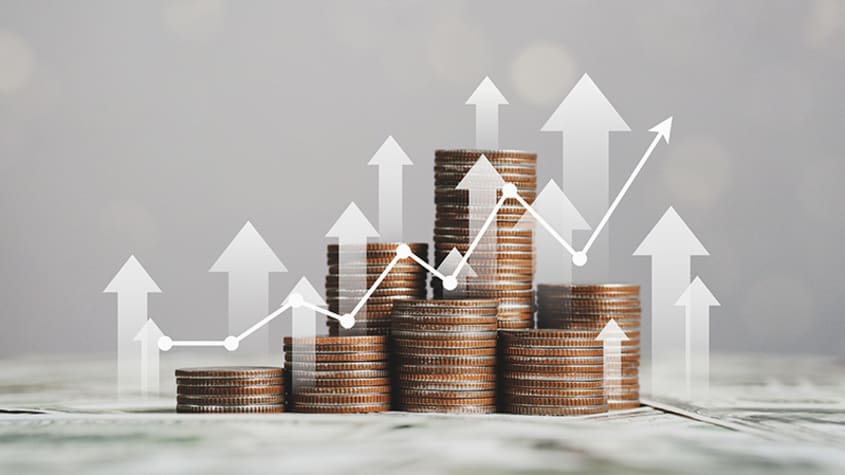 Piles de pièces de monnaie formant une progression ascendante