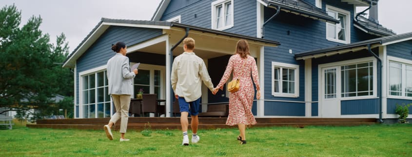 Young couple visiting a house they'd like to buy