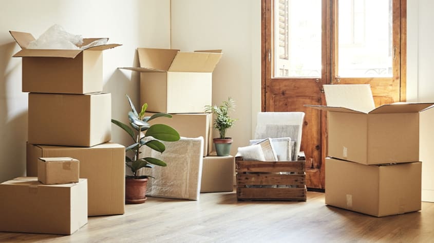 moving boxes on the floor of an apartment